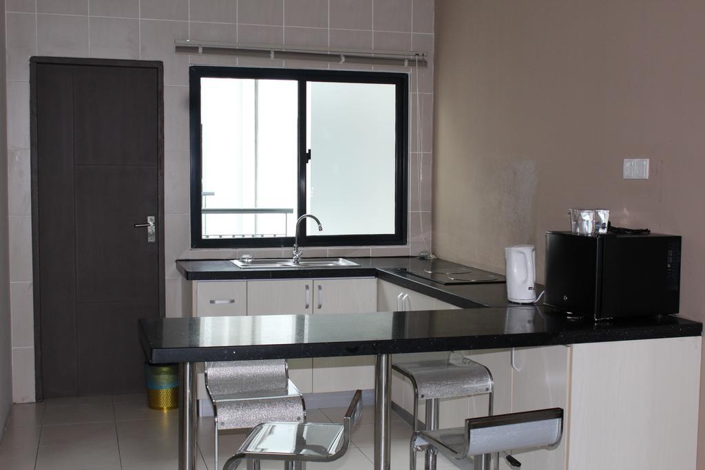 Tribeca Suites Kuching Exterior photo